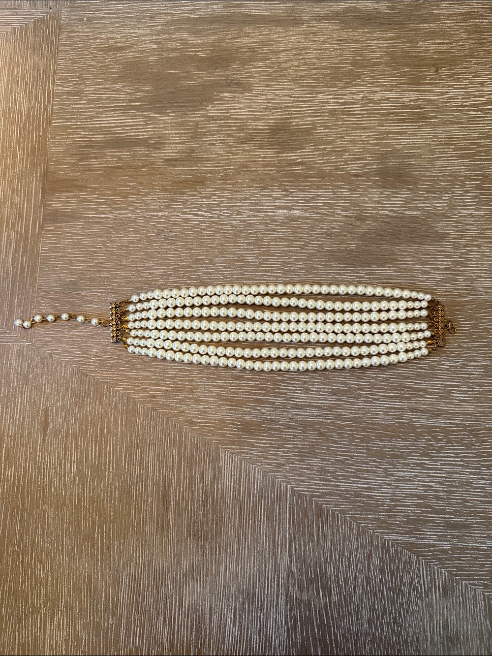 Seven-Strand Pearl Choker Necklace in Cream with Gold Accents